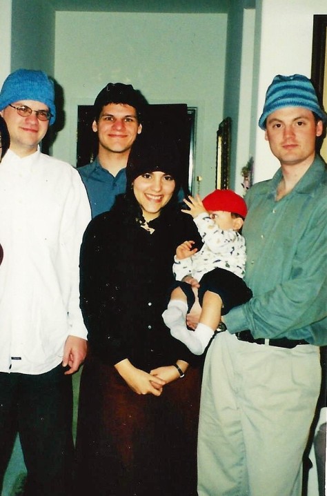2 brothers, 1 wife well, before they were married), 1 son, 1 husband all in hats