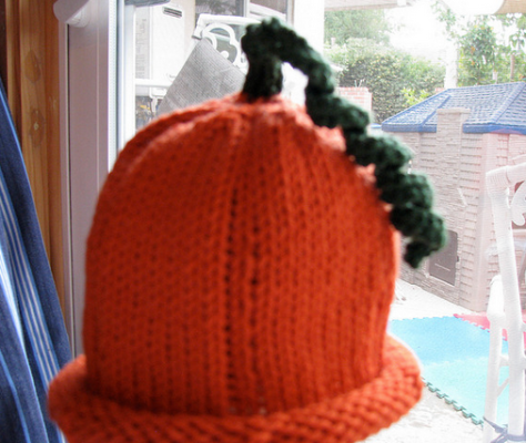 A little pumpkin hat I made.